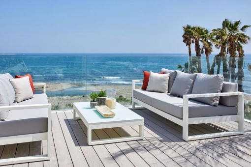 Terrace with lounge furniture and sea views