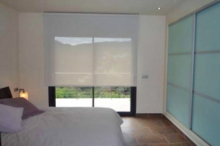 One of the 3 bright bedrooms