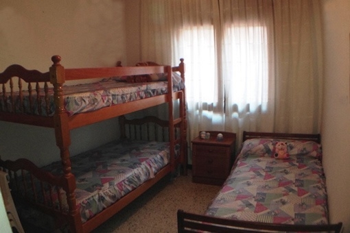 Kinderzimmer mit 3 Betten