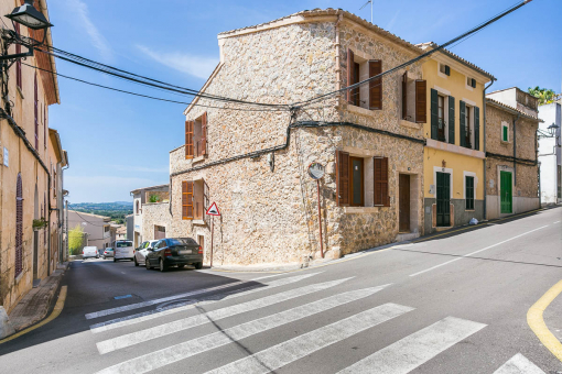 Corner house with rustic stone facade