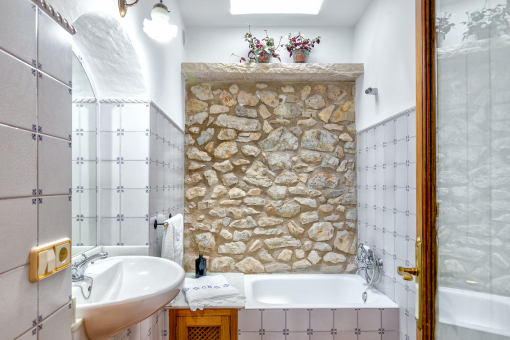 Beautiful natural stone wall in the bathroom