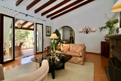 Bright living area with wooden beams