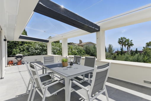 Spacious terrace area with BBQ and sea view