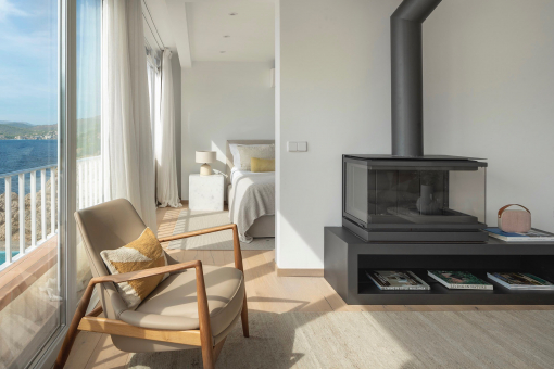 Open-plan living area with a cozy fireplace