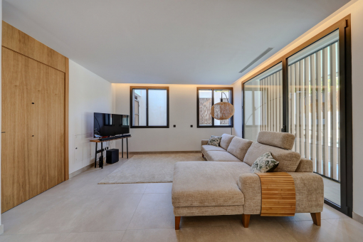 Living area with access to the pool