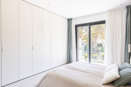 One of the bedrooms with built in wardrobes