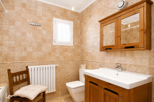 Bathroom with bathtub in the ground floor