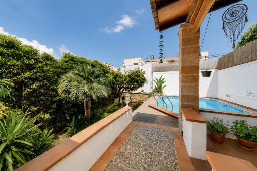 Pool area with adjoining garden