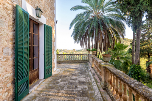 A spacious terrace surrounds the main building