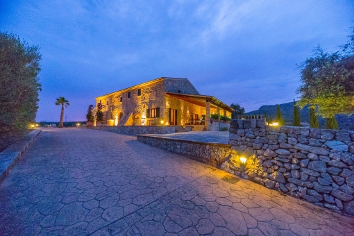 Views to the natural stone finca by night