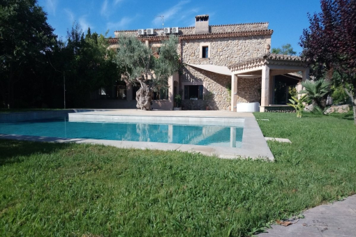 Well-tended garden with pool
