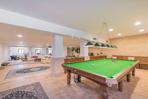 Extensive poolroom with lounge area