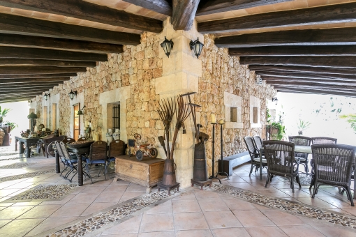 Beautiful, rustic terrace with wooden ceiling beams