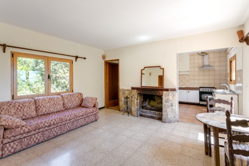 Living area with rustic fireplace