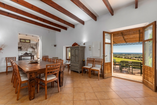 Rustic dining area with terrace access