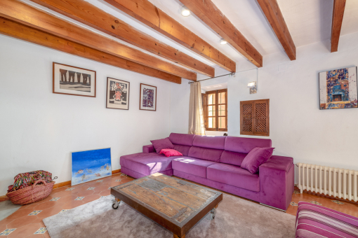 Beautiful living area with wooden ceiling beams