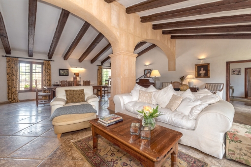 Living area with wooden ceiling beams