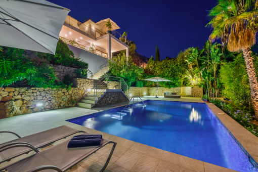 Smashing villa with pool and sea views located on a slope in luxurious part of Port de Pollensa