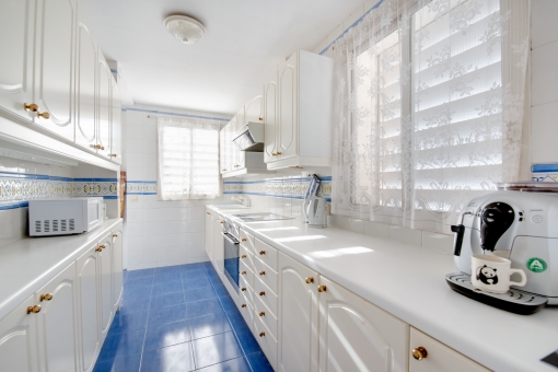 Spacious kitchen in white