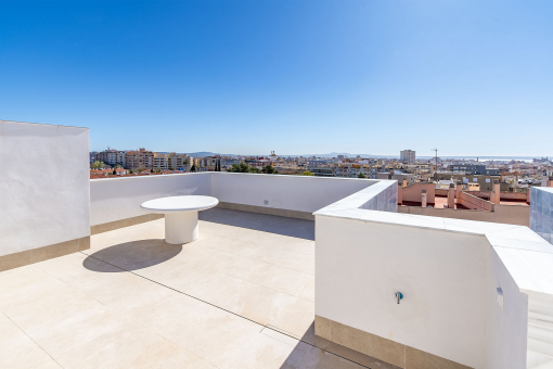 Roof terrace with sea and city view