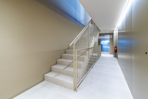 Entrance hall with staircase and elevator