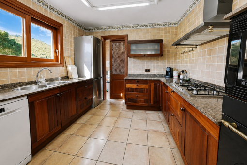 Bright spacious kitchen with modern appliances
