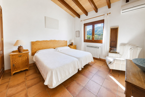 Bright bedroom with mountain view window