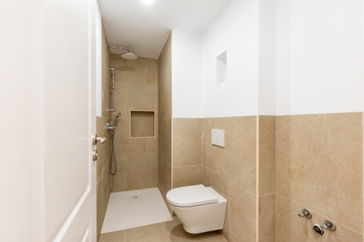 Noble bathroom with walk-in shower