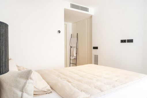 one of three bedrooms