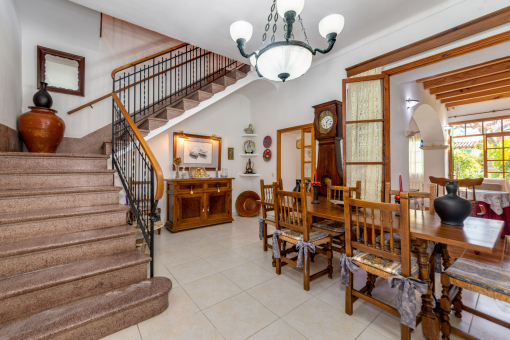 Spacious dining area with stairs