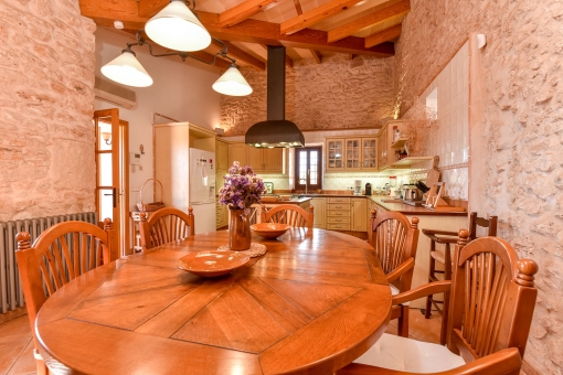 Dining area with natural stone wall