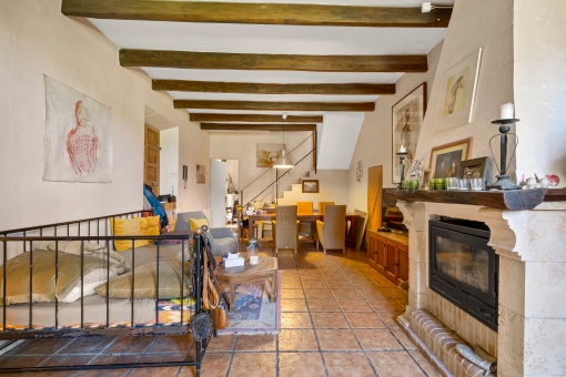 Living and dining area with fireplace