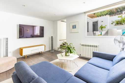 Cosy living area with access to a patio