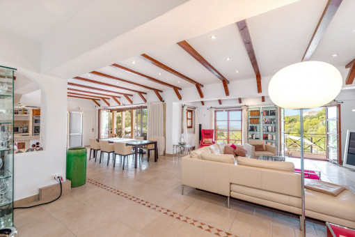 Living and dining area with terrace access