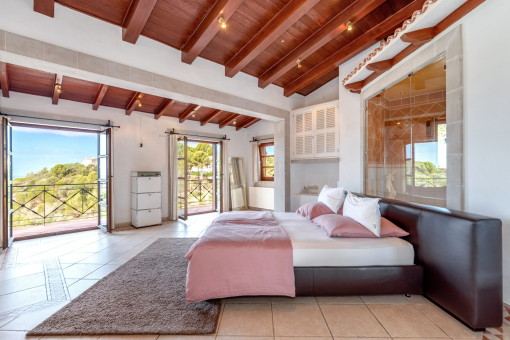 Spacious bedroom with lanscape views