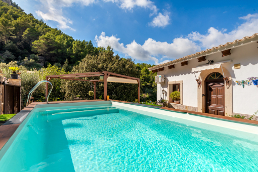 Pool iImpressive finca with pool in Puigpunyents located on the terrace