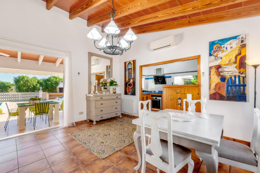 The dining area adjoins the kitchen