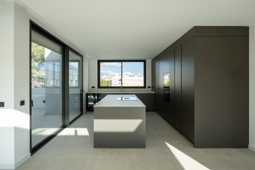 Open kitchen with access to the terrace