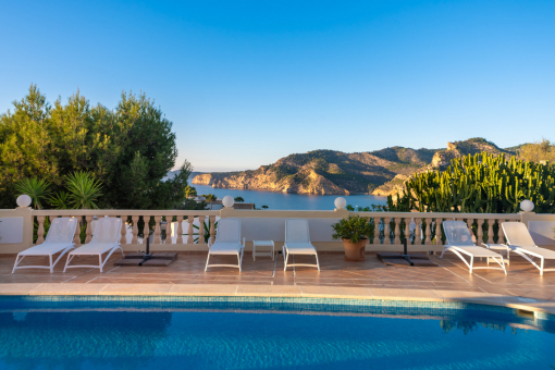 Pool area with mountain and sea views