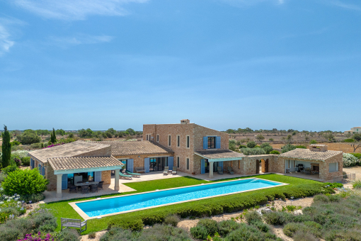 Finca with mediterranean natural stone facade