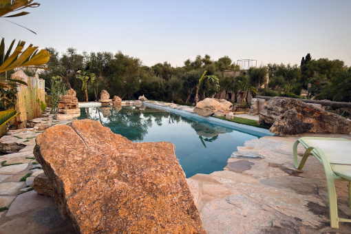 Saltwater pool surrounded by natural stone