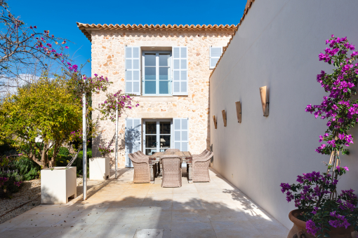 Sunny terrace with outdoor dining area