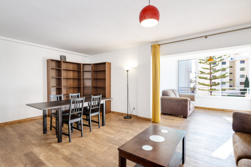 Light-flooded living and dining area