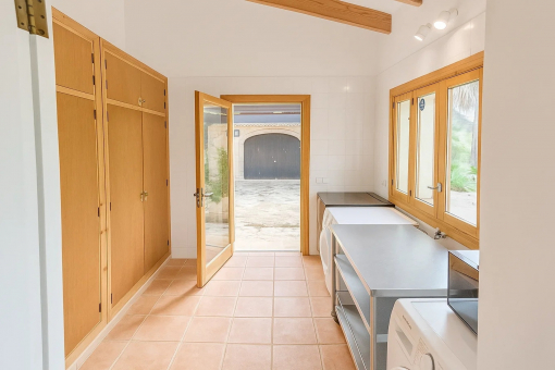 Laundry room with access to the outdoors