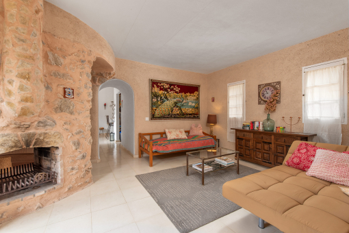 Living area with open fireplace