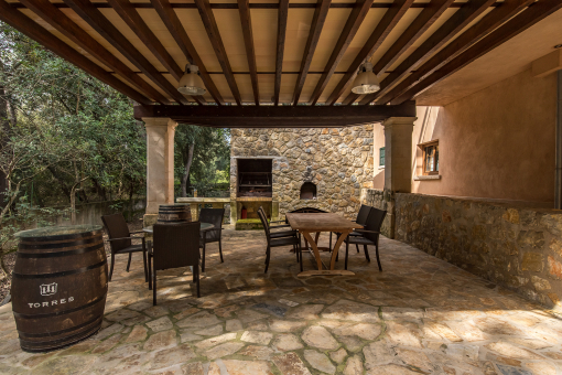 Outdoor dining area next to BBQ