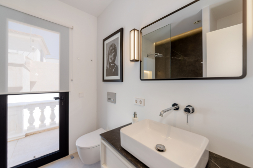 One of three bathrooms