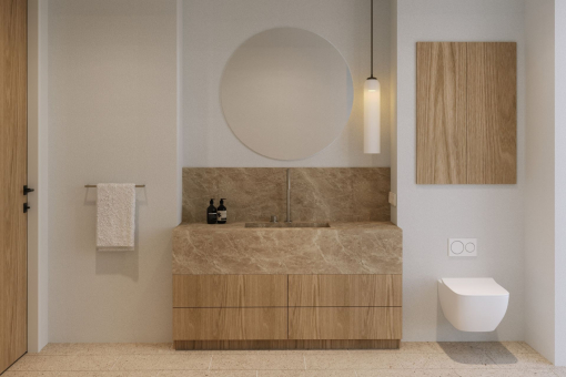 High-end en-suite bathroom with natural stone