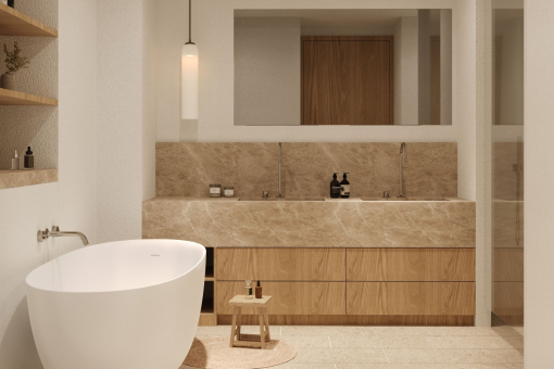 High-end en-suite bathroom with natural stone and freestanding bathtub – timeless design and comfort