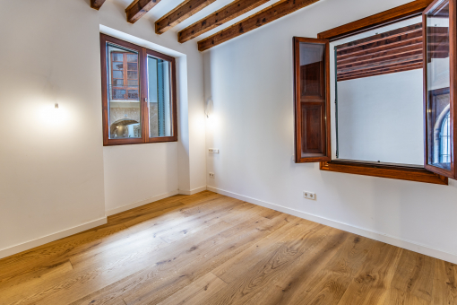 One of three bedrooms